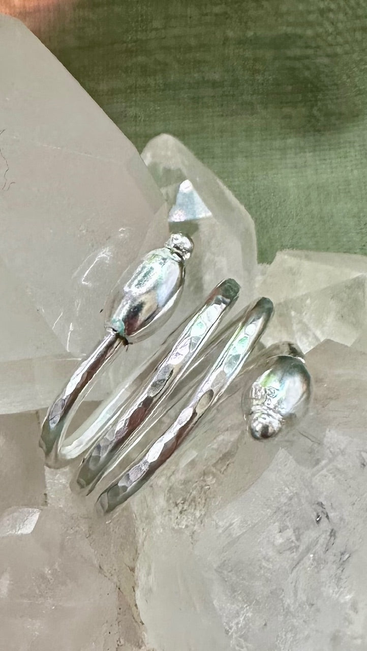 Silver Beaded helix ring.