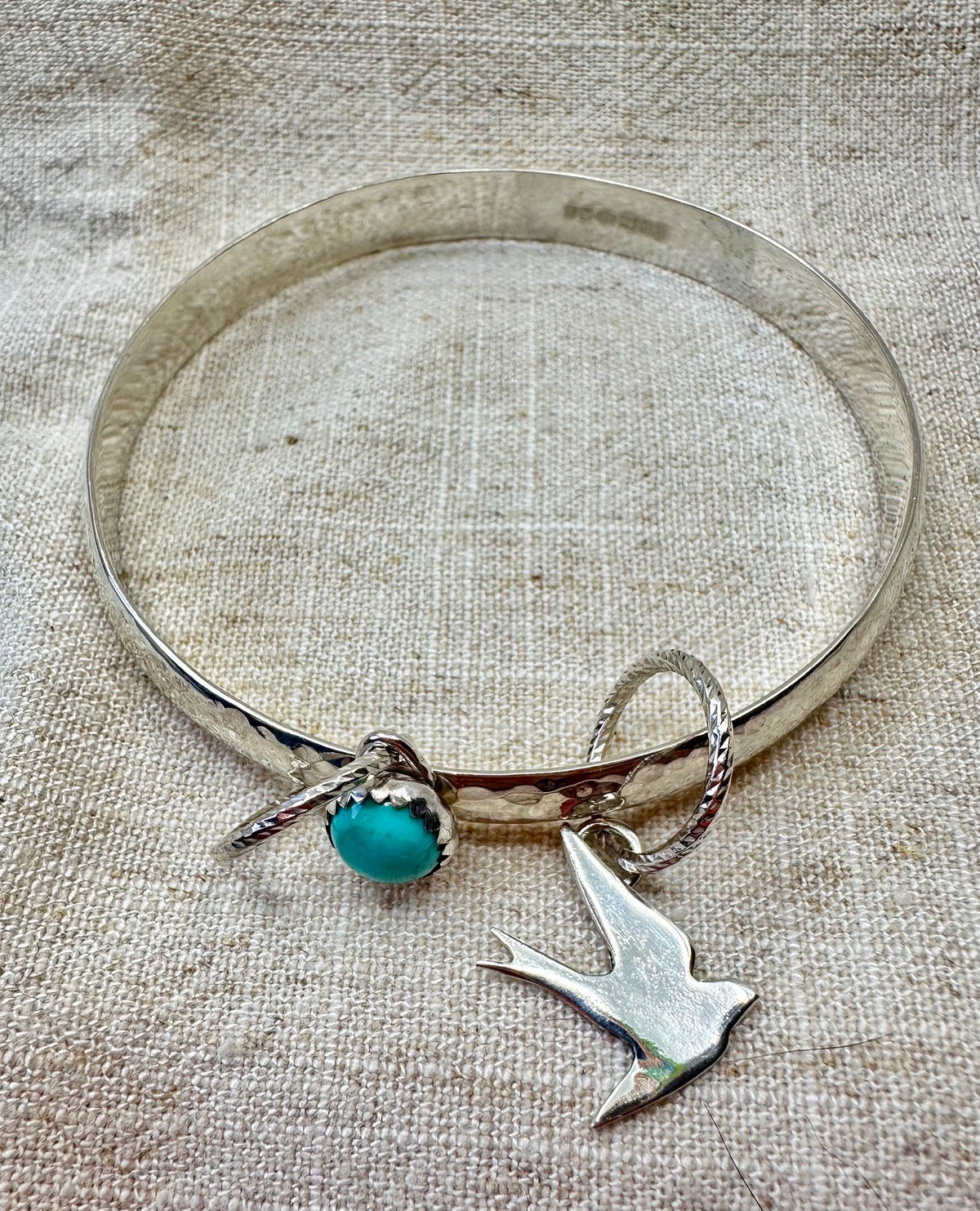 Silver swallow and turquoise charm bangle