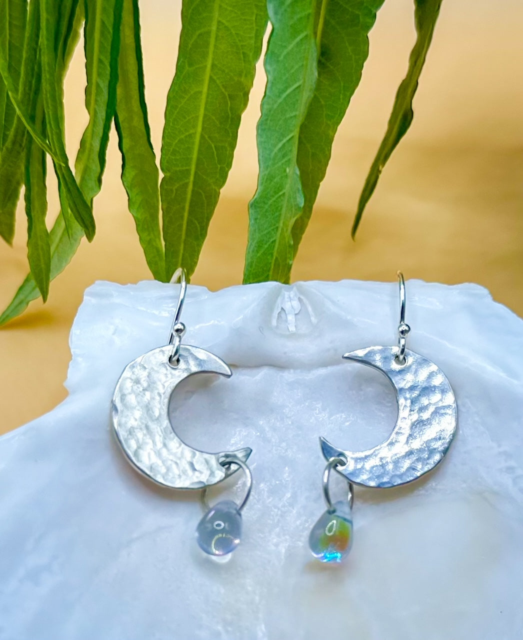 Silver crescent moon earrings with glass drop