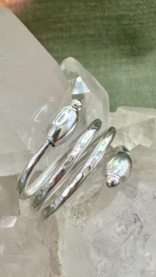 Silver Beaded helix ring.